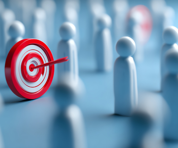 A red target struck by an arrow among a crowd of identical figures, representing the focused attention and personal dedication of fans in Oshikatsu culture.